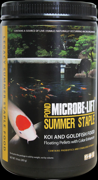 Black jar of Microbe-Lift Summer Staple Koi & Goldfish Food with yellow label showing koi fish in pond.