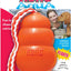 Packaged Kong Aqua dog toy in orange with red and white rope, medium size.