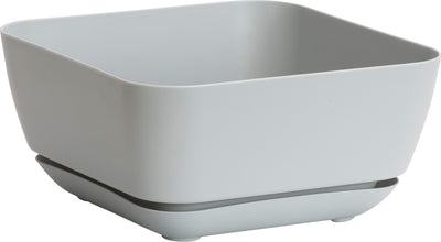 Gray square garden planter with attached tray, front view, close-up