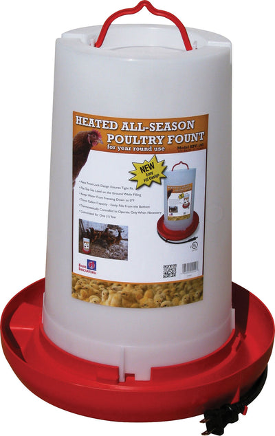A white and red heated poultry fountain with a red base, white container, and red handle, labeled 'Heated All-Season Poultry Fountain' on its front.