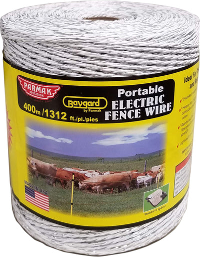 A spool of white Parmak Baygard portable electric fence wire, 1312 feet long, packaged with a yellow label showing cows in a field.