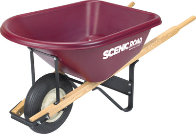 A maroon Scenic Road wheelbarrow with a wooden handle and black metal frame, viewed from the side.