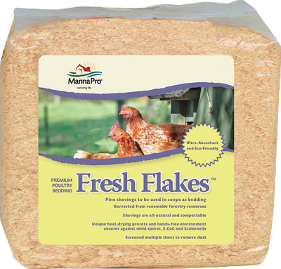 Packaged Manna Pro Fresh Flakes poultry bedding in a clear plastic bag showing pine shavings.