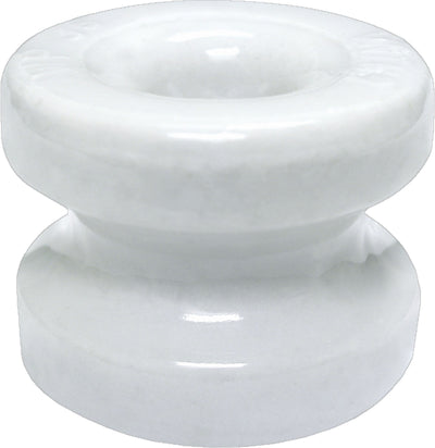 Close-up of a white ceramic insulator with a rounded top and base, showing its smooth surface.