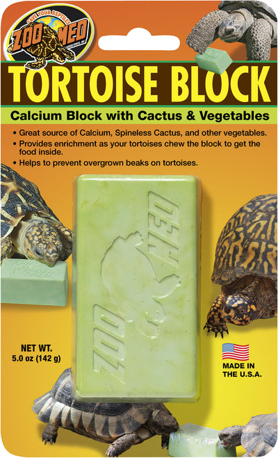 Packaged Zoo Med Tortoise Block with green block, tortoise illustrations, and product details on a yellow background.