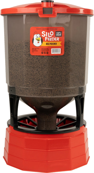 Red and clear plastic Happy Hen Silo Feeder with 65 pound capacity, front view, packaged product