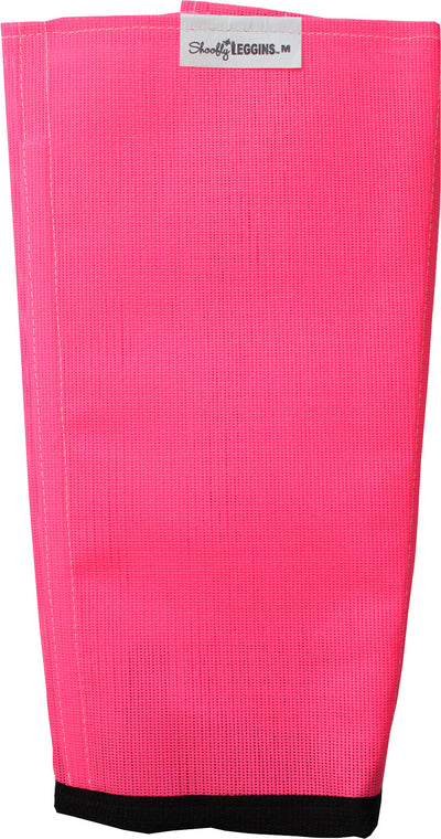 Close-up of a pink Shoofly Leggins with black trim at the bottom, showing the brand label.