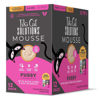 Packaged product: Tiki Cat Solutions Mousse Fussy with duck liver & egg in broth, 12-pack of 2.4 oz pouches, pink and black box.