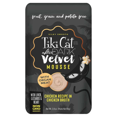 Front view of Tiki Cat After Dark Velvet Mousse chicken pouch with black background and cat illustration.