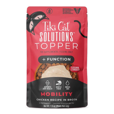 Front view of a red and black packaged Tiki Cat Solutions Topper pouch with chicken recipe in broth.