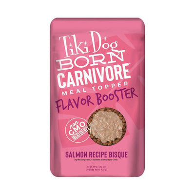 Pink packaged Tiki Dog Born Carnivore Meal Topper Flavor Booster with Salmon Recipe Bisque, 1.5 oz front view
