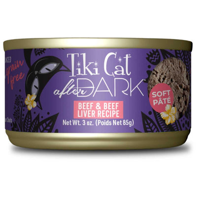 Front view of a Tiki Cat After Dark canned cat food package with purple label, showing beef and beef liver pate, 3 oz size.