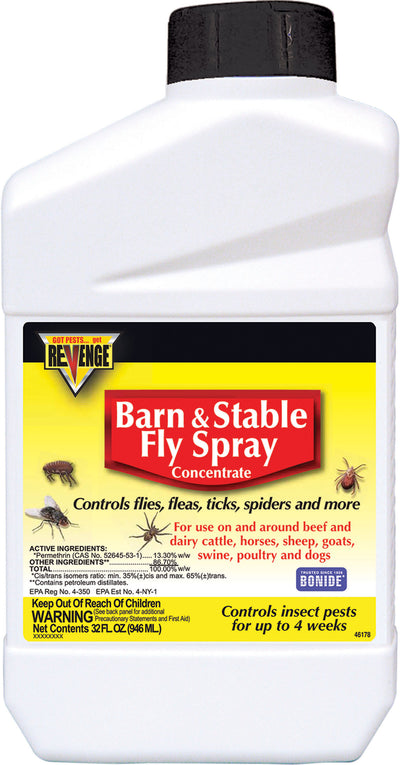 Front view of a white bottle with a black cap labeled 'Revenge Barn & Stable Fly Spray Concentrate' in yellow and red.