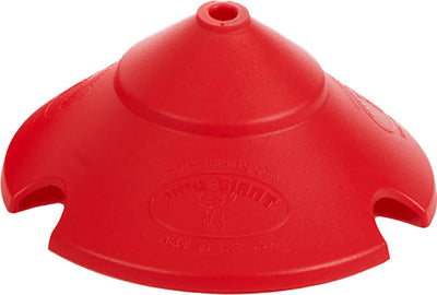 Close-up of a red plastic poultry feeder cover with cutouts and embossed text.