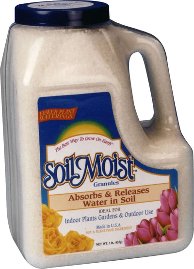 A blue-capped jug of Soil Moist Granules with a label showing yellow roses and pink tulips, front view.
