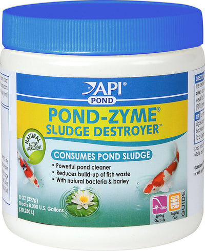 Front view of a white and blue API Pond-Zyme Sludge Destroyer container with 8 oz label.