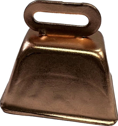 Close-up of a copper miniature cow bell with a rectangular body and loop handle.