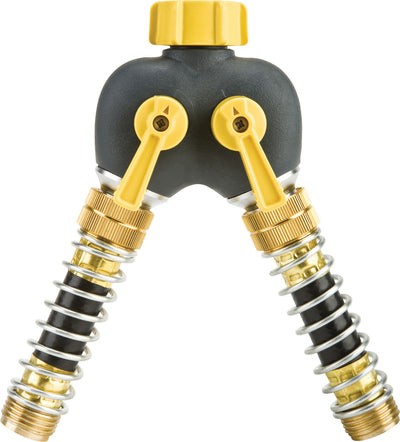 Close-up of a black and yellow metal shut-off valve with two brass threaded hoses and spring connectors.